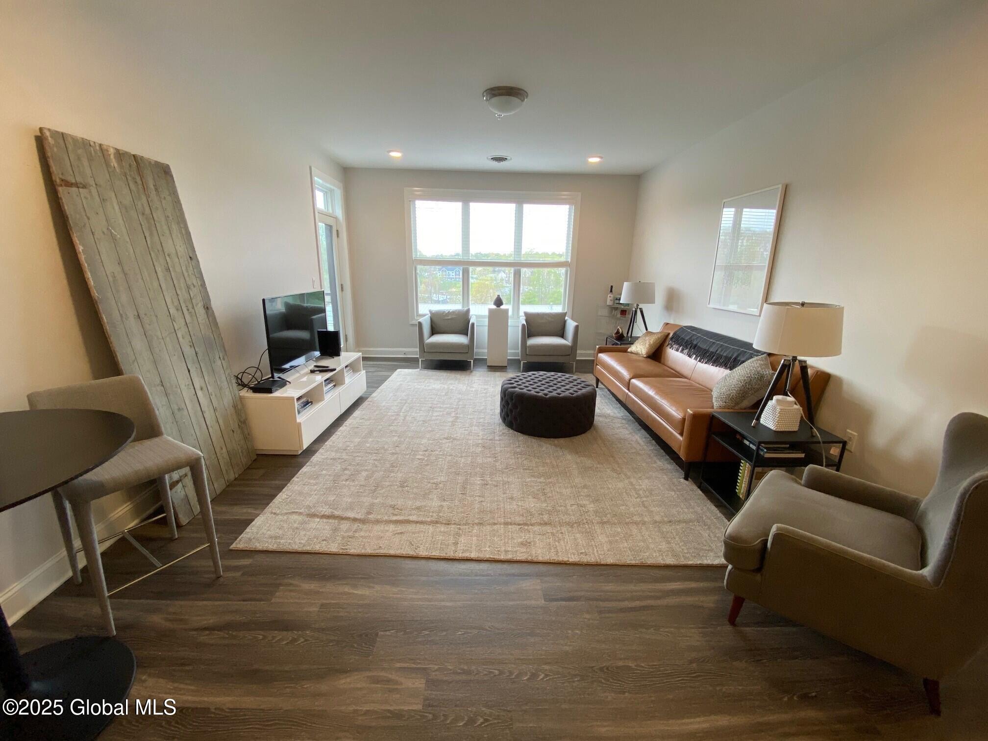 130 Excelsior Avenue, Unit 414 Saratoga Springs, NY 12866 - Photo 8 of 15 Living Room 2