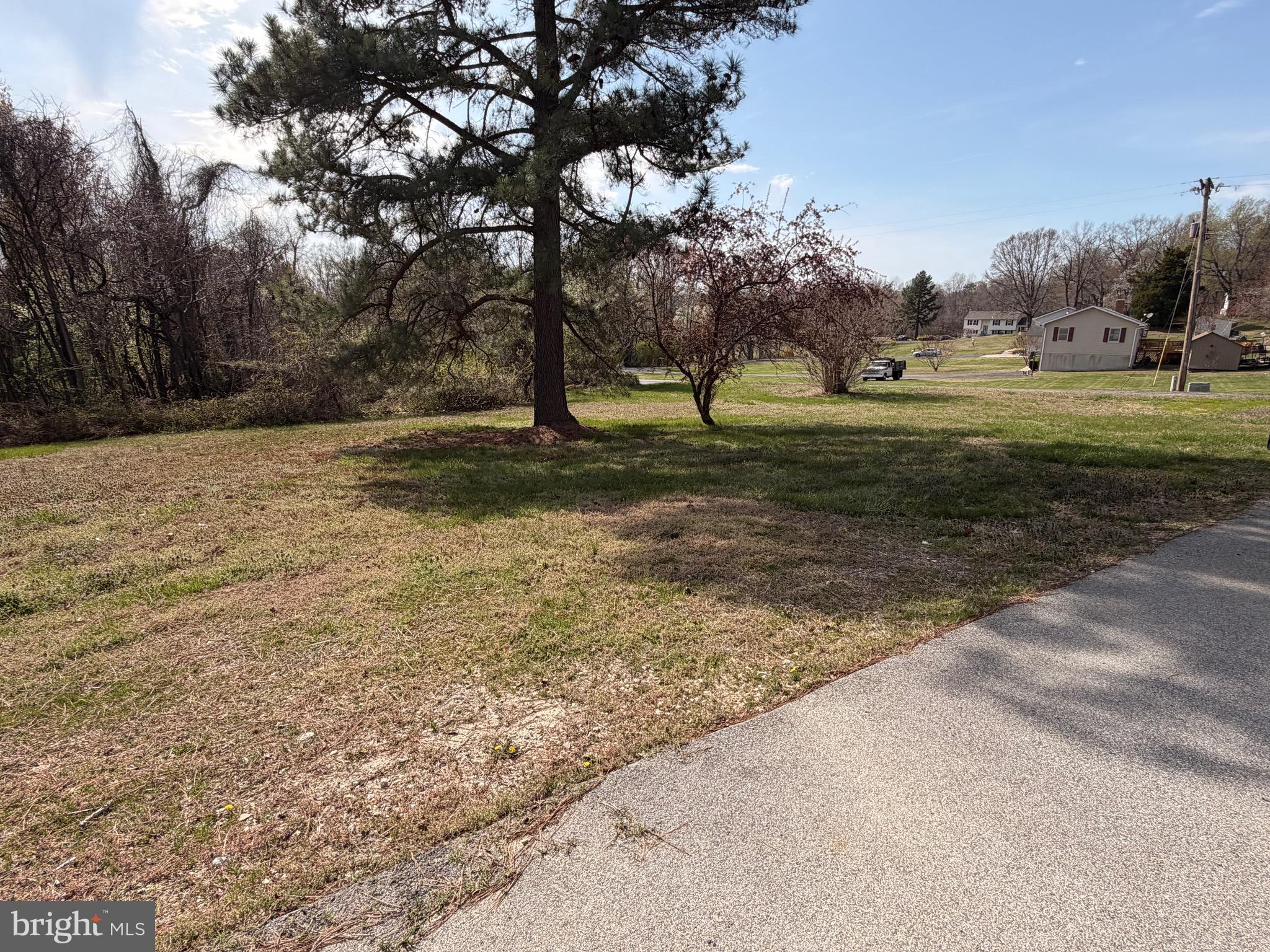 7285 Clyde Jones Road Owings, MD 20736 - Photo 36 of 37 Driveway and side yard