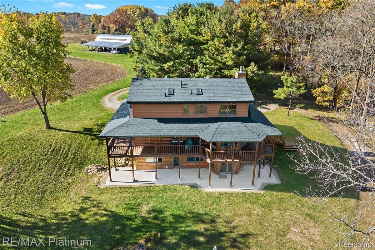 1215 South Bull Run Road Fowlerville, MI 48836 - Photo 47 of 80 New back patio