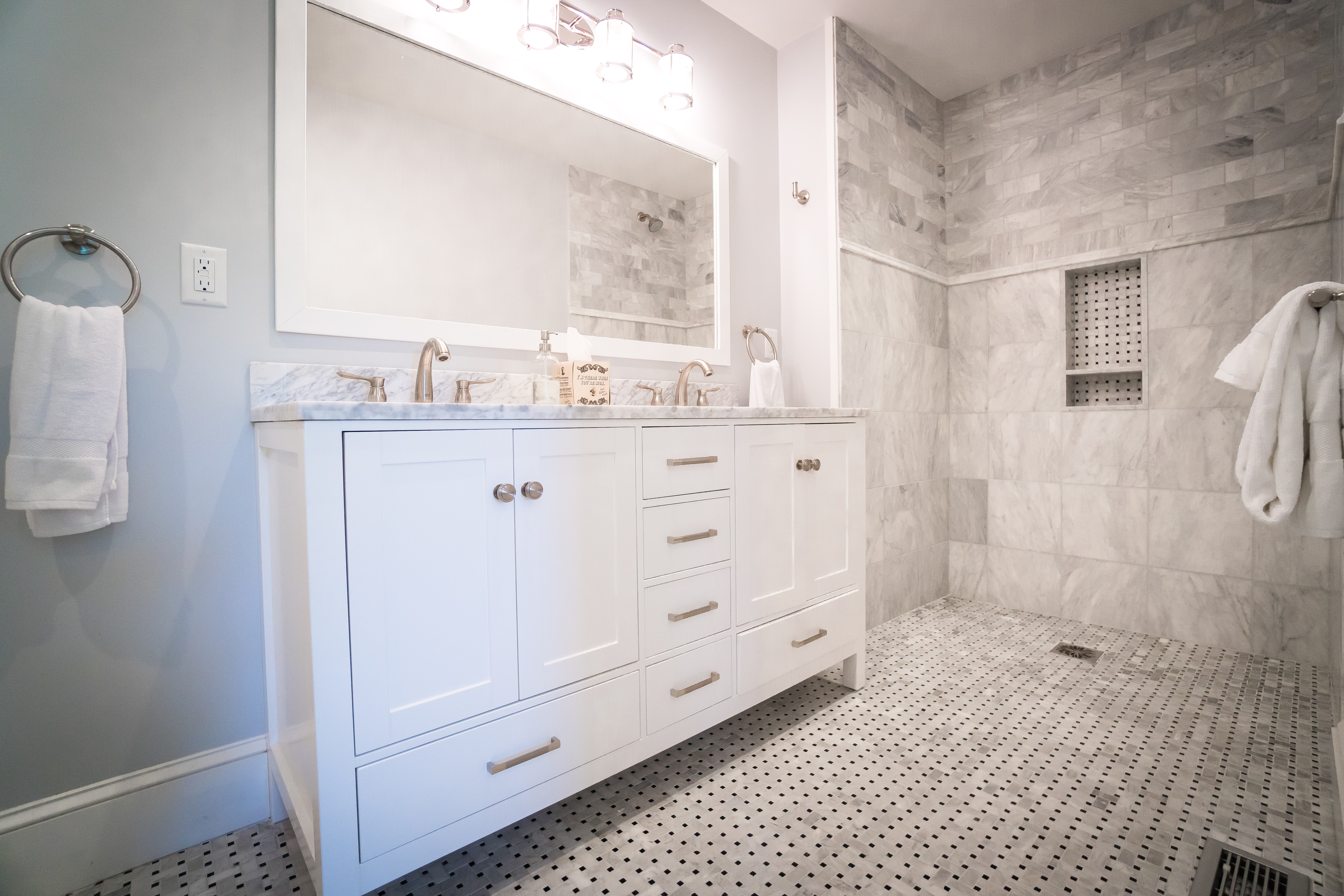 50 Lovers Lane Nantucket, MA 02554 - Photo 15 of 34 a bathroom with a sink a mirror and a shower