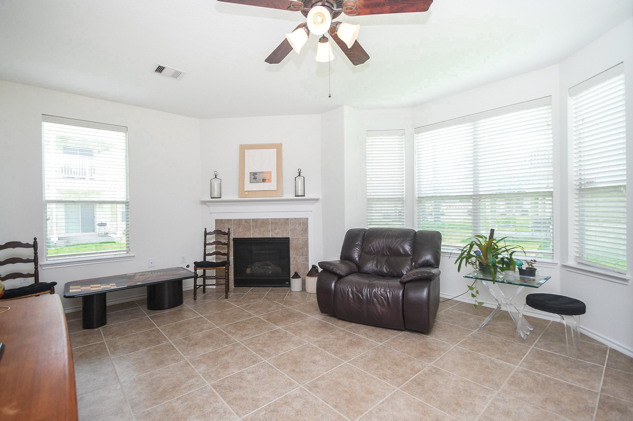 13600 Breton Ridge Street, Unit 36F Houston, TX 77070 - Photo 12 of 38 Comfortable gathering space with large windows and an airy feel.
