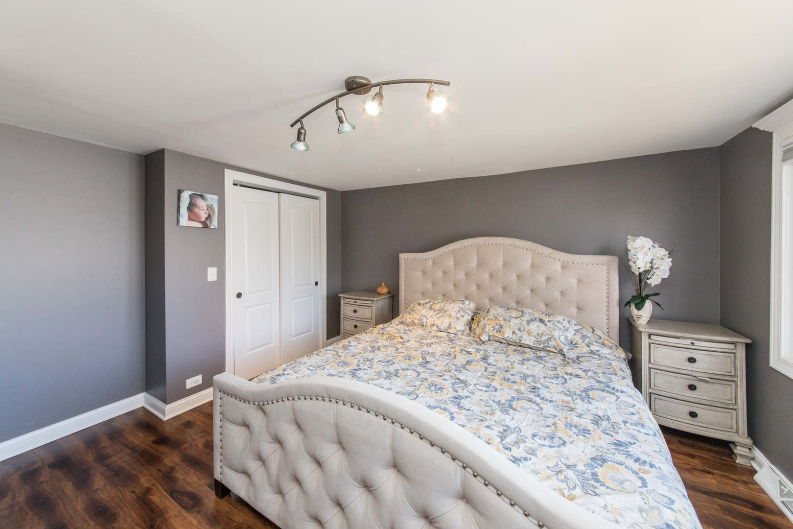 8653 North Merrill Street Niles, IL 60714 - Photo 11 of 19 a bedroom with a bed and a tv