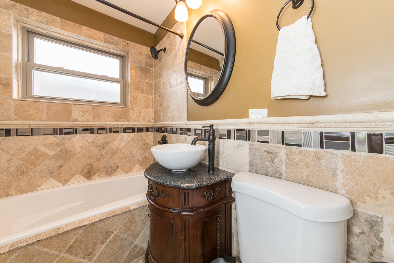 8653 North Merrill Street Niles, IL 60714 - Photo 14 of 19 a bathroom with a sink and a mirror
