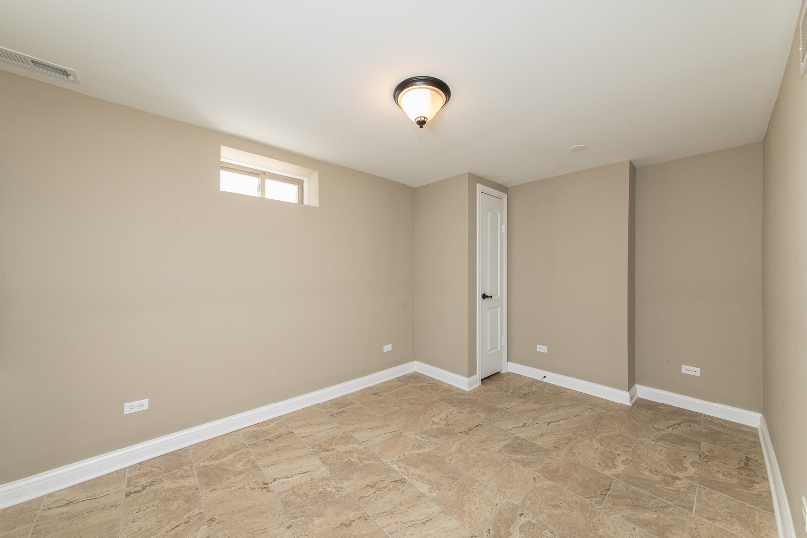 8653 North Merrill Street Niles, IL 60714 - Photo 17 of 19 a view of an empty room
