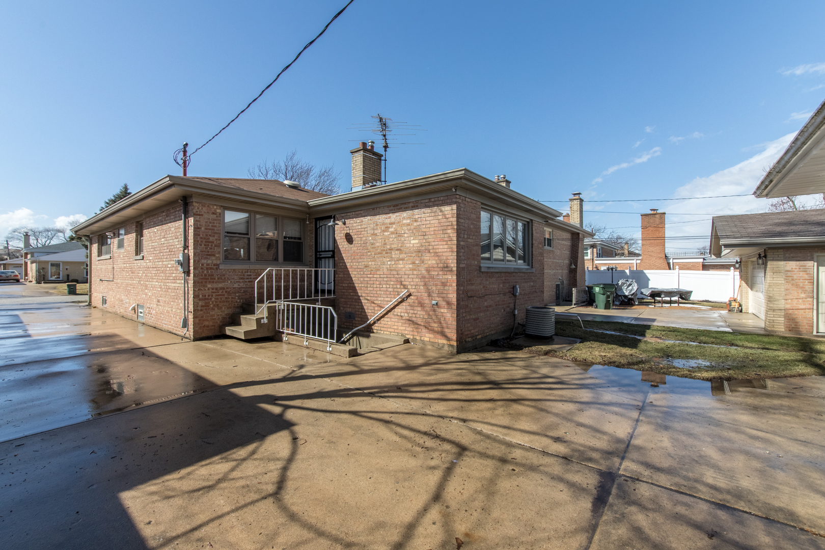 8653 North Merrill Street Niles, IL 60714 - Photo 19 of 19 a view of a house with a patio