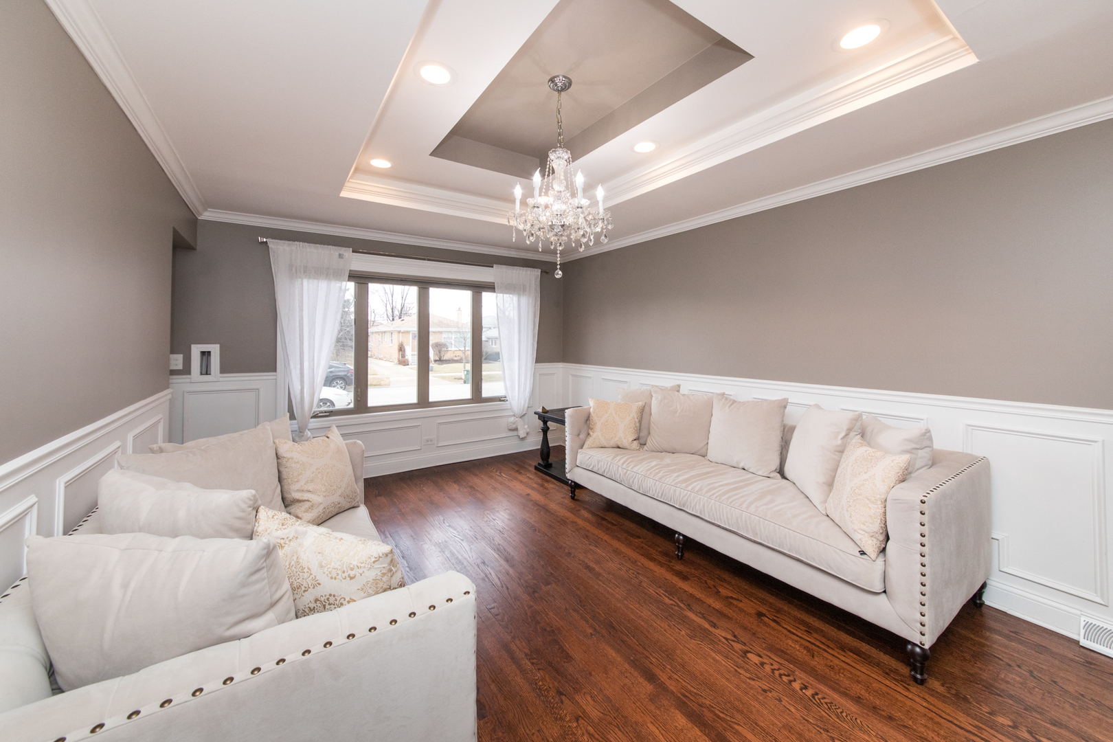 8653 North Merrill Street Niles, IL 60714 - Photo 4 of 19 a living room with furniture and a large window