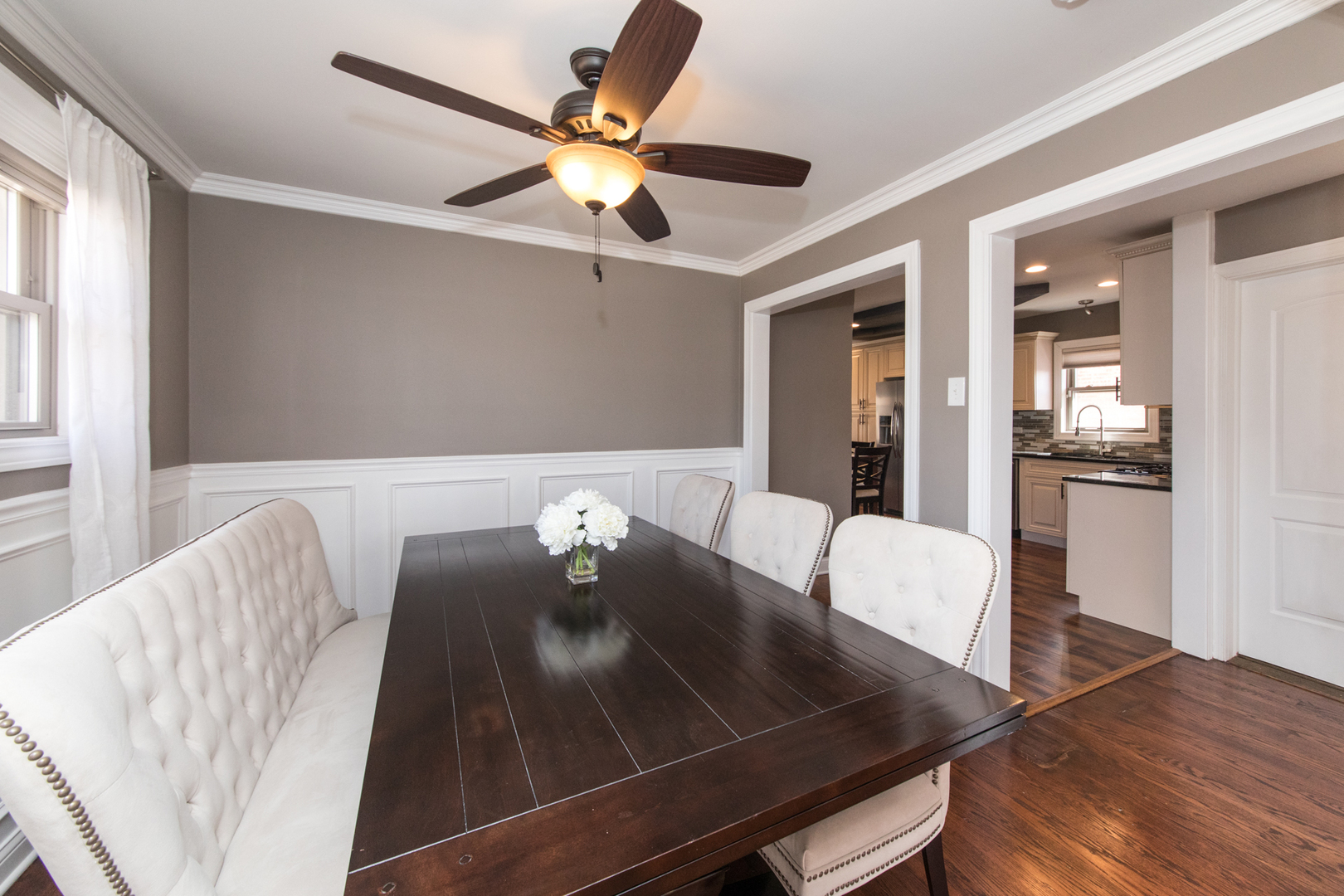 8653 North Merrill Street Niles, IL 60714 - Photo 6 of 19 a view of a dining room with furniture and wooden floor