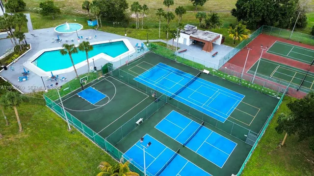 an aerial view of a chairs and table chair