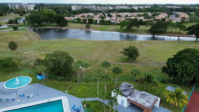 a view of a lake with a yard