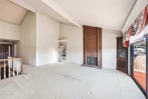 a view of livingroom with furniture and window