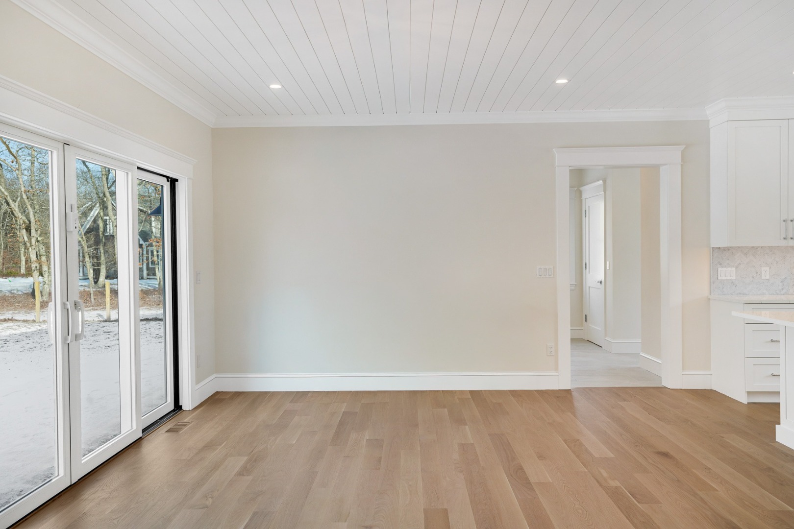 9 Martha's Way Edgartown, MA 02539 - Photo 11 of 41 an empty room with wooden floor and windows