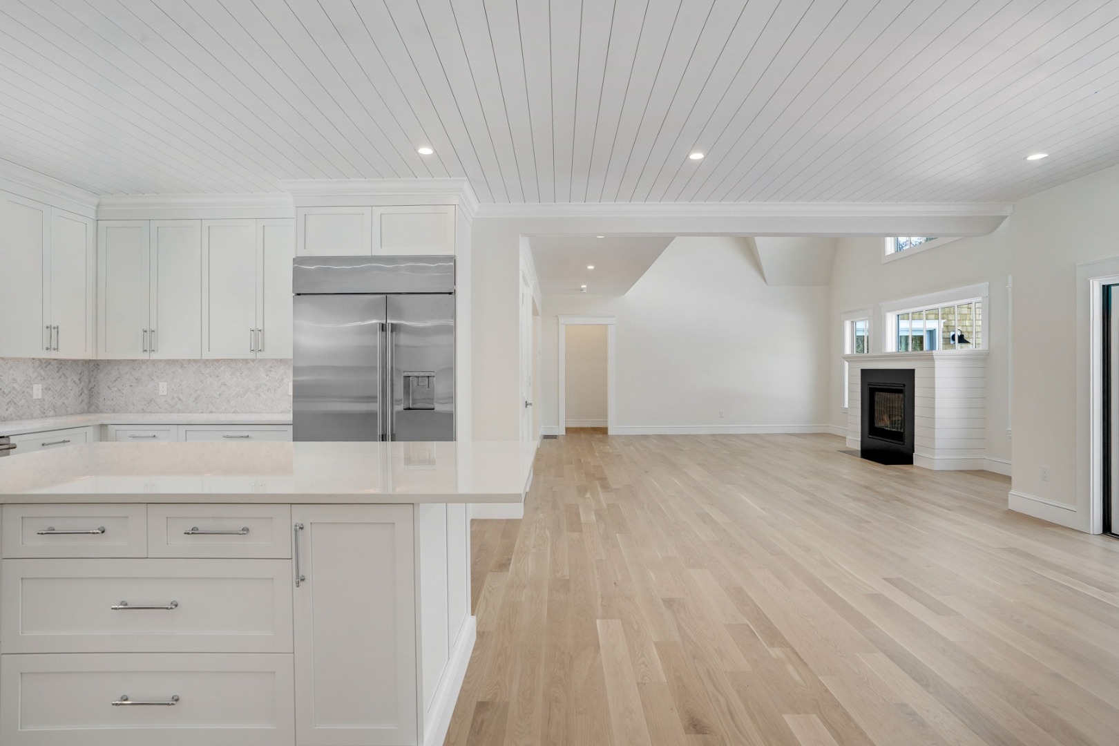 9 Martha's Way Edgartown, MA 02539 - Photo 16 of 41 a view of kitchen with cabinets and wooden floor