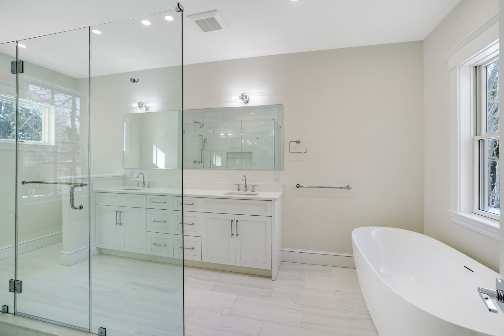 9 Martha's Way Edgartown, MA 02539 - Photo 23 of 41 a bathroom with a tub sink shower and mirror