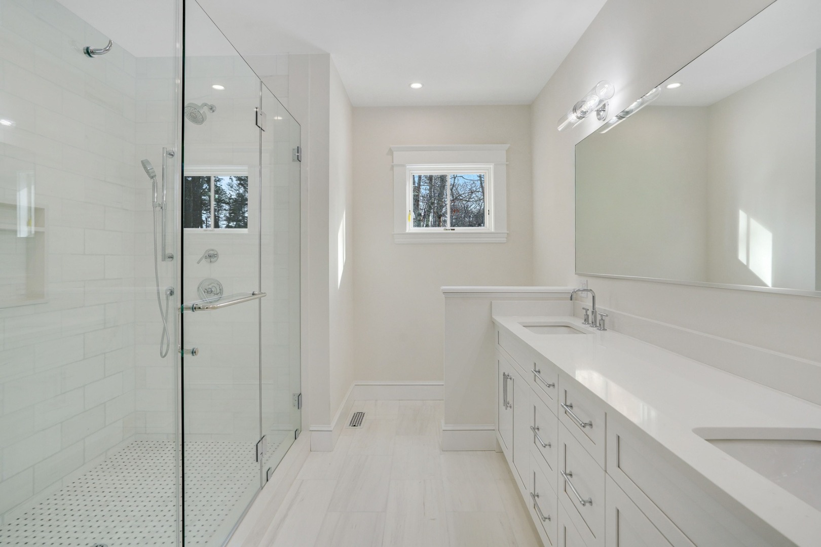 9 Martha's Way Edgartown, MA 02539 - Photo 24 of 41 a bathroom with a double vanity sink mirror and shower