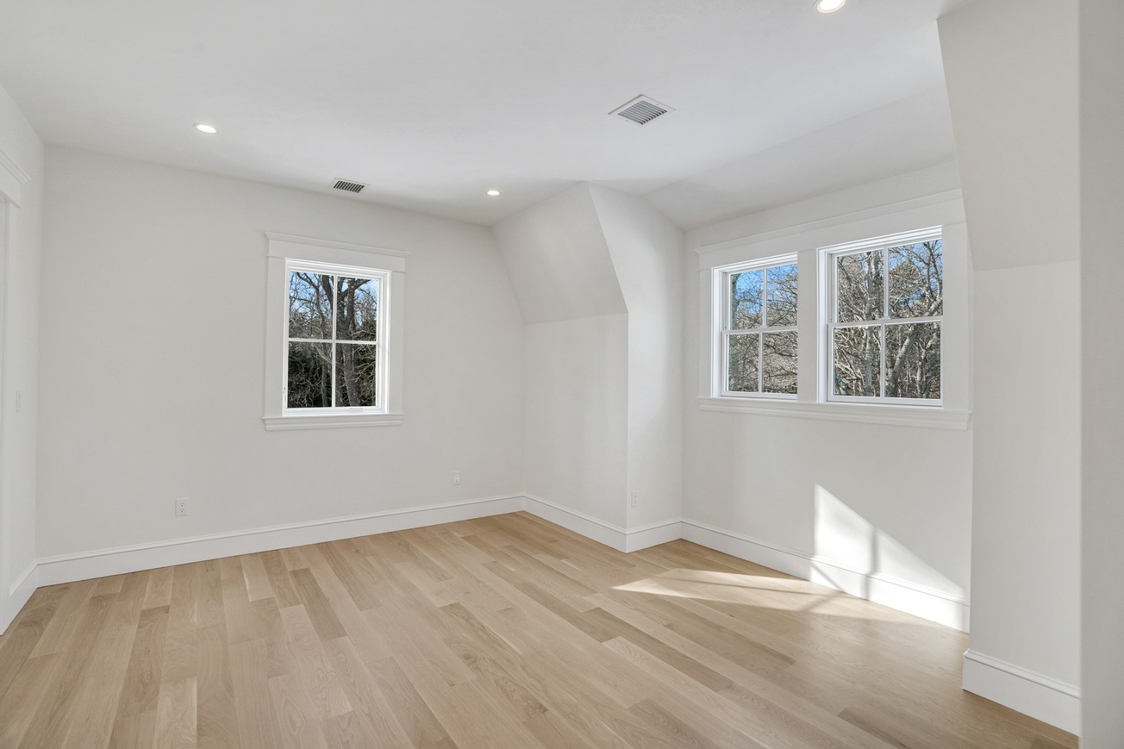 9 Martha's Way Edgartown, MA 02539 - Photo 34 of 41 a view of empty room with wooden floor and fan