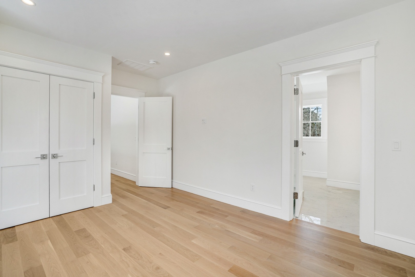 9 Martha's Way Edgartown, MA 02539 - Photo 35 of 41 a view of an empty room with wooden floor