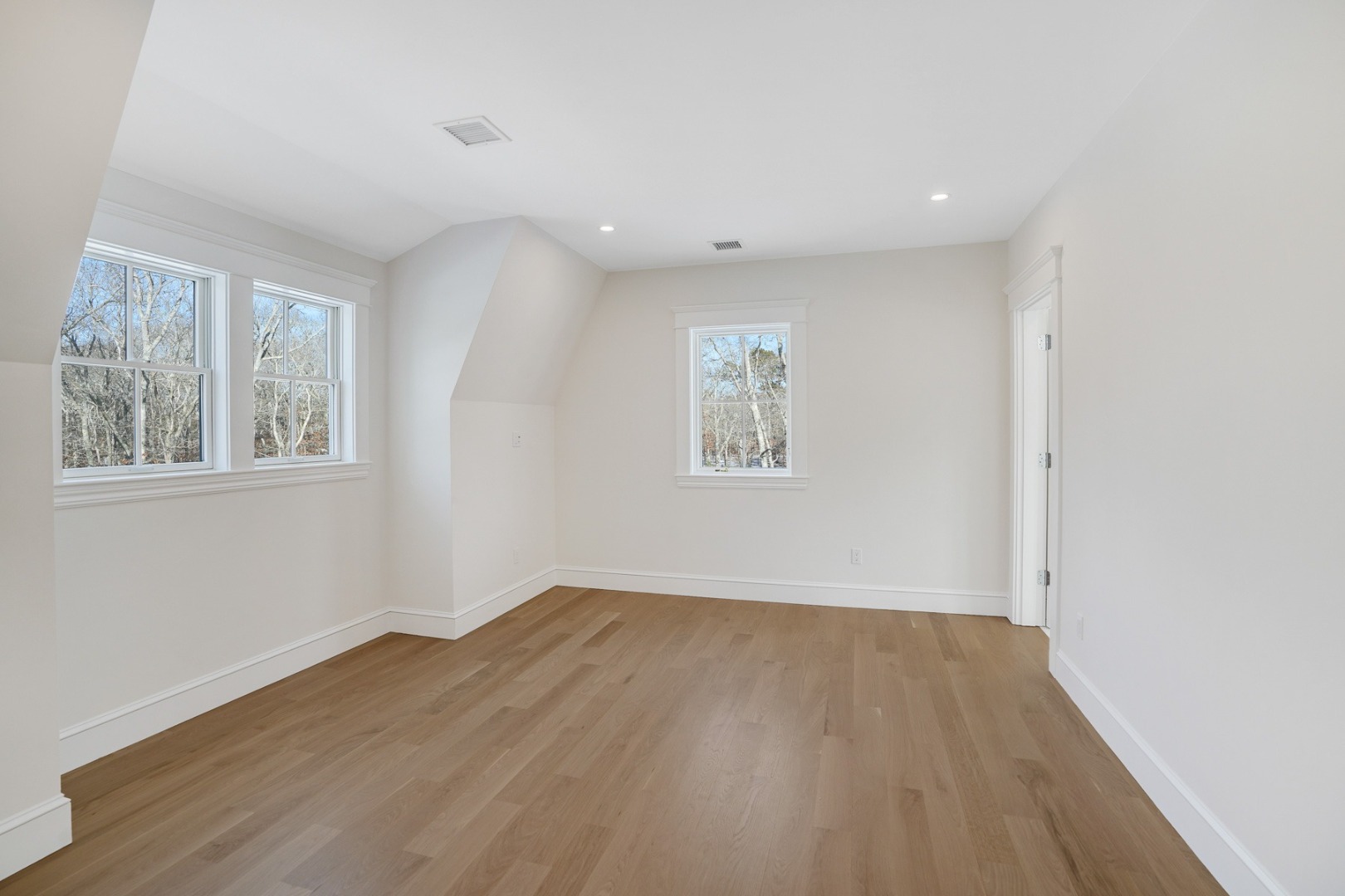 9 Martha's Way Edgartown, MA 02539 - Photo 40 of 41 a view of empty room with wooden floor and fan