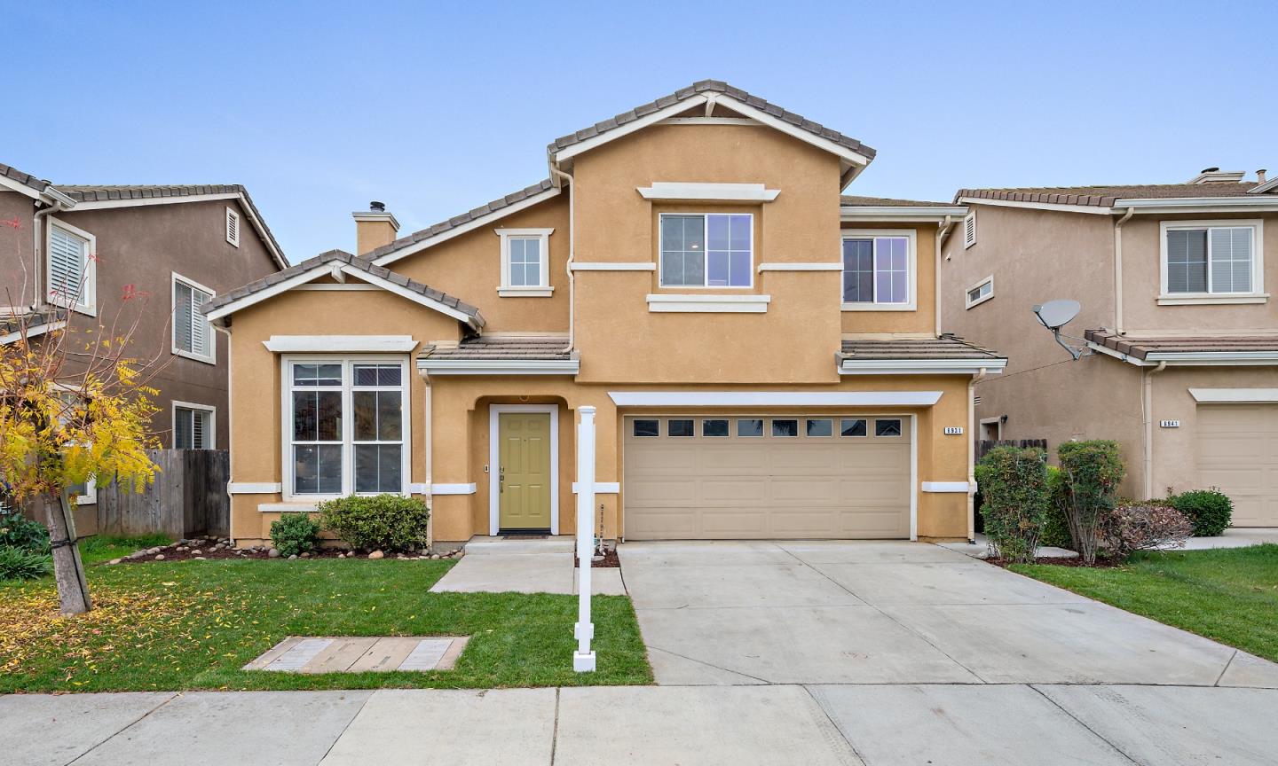 8931 Del Rio Circle Gilroy, CA 95020 - Photo 1 of 18 front view of a house with a yard