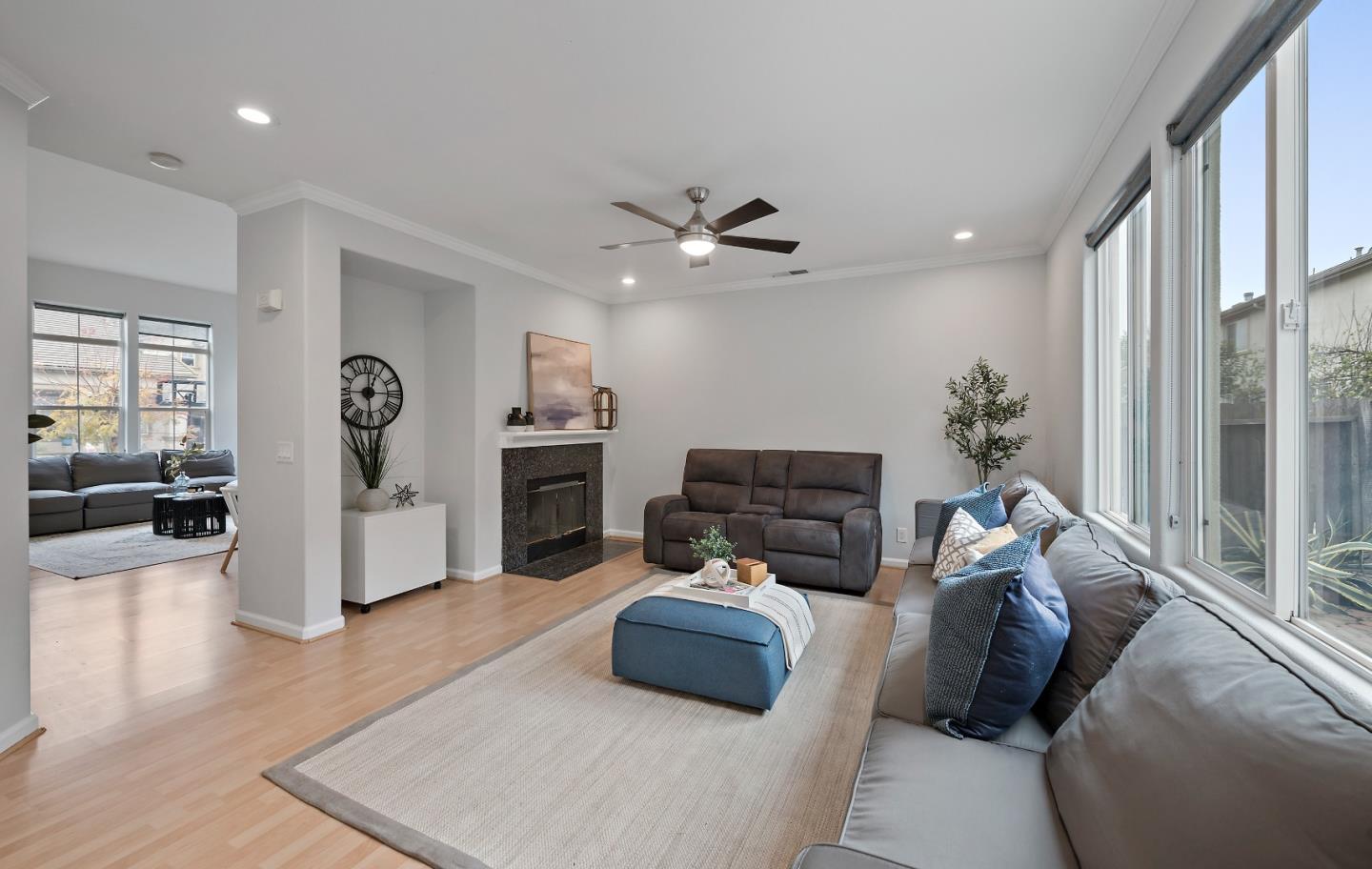 8931 Del Rio Circle Gilroy, CA 95020 - Photo 4 of 18 a living room with furniture and a chandelier