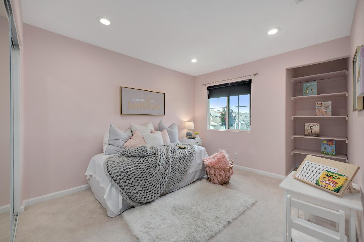 8931 Del Rio Circle Gilroy, CA 95020 - Photo 9 of 18 a bedroom with furniture and a window
