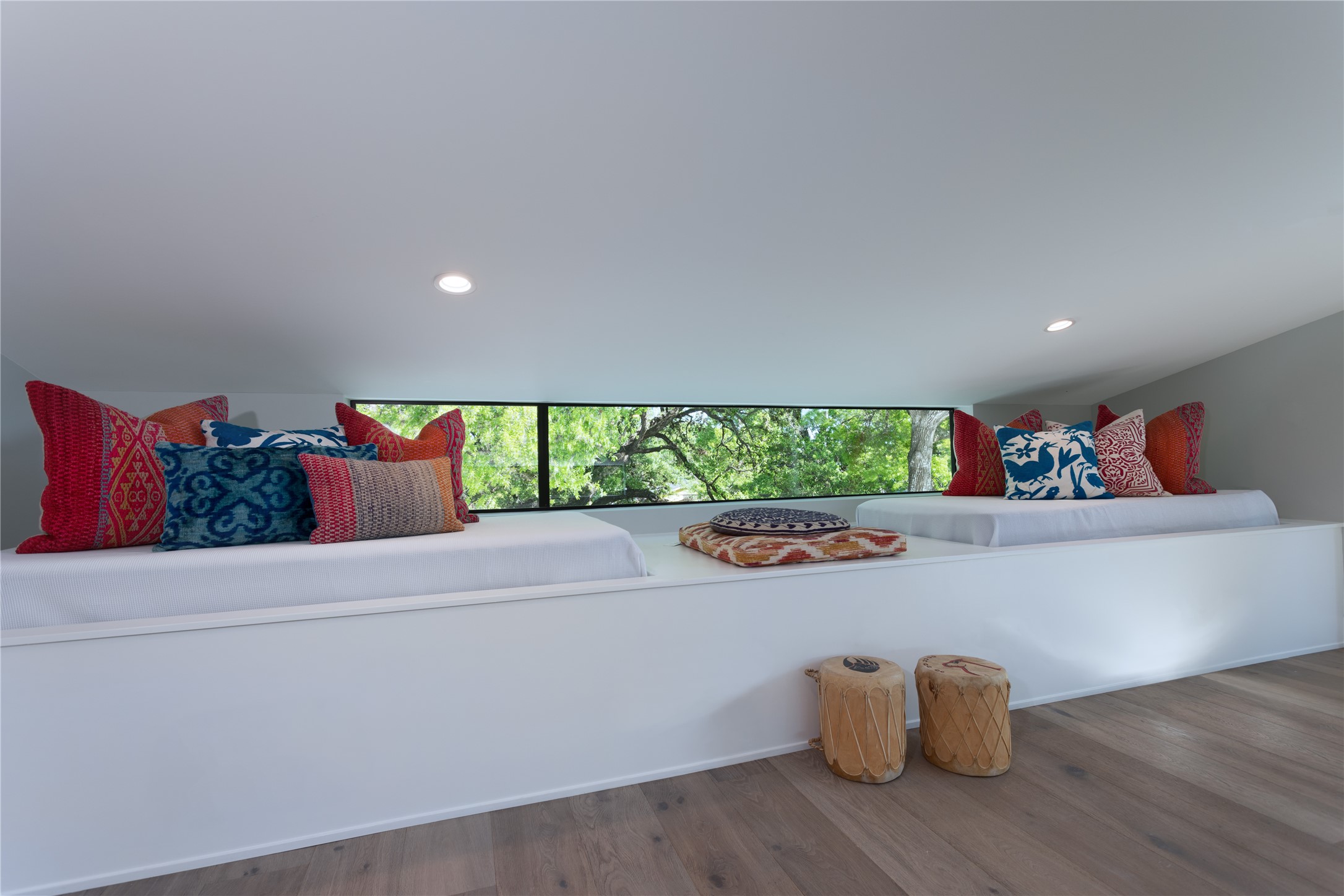 700 Jessie Street Austin, TX 78704 - Photo 22 of 40 Third Floor bonus room with wood finished floors and recessed lighting