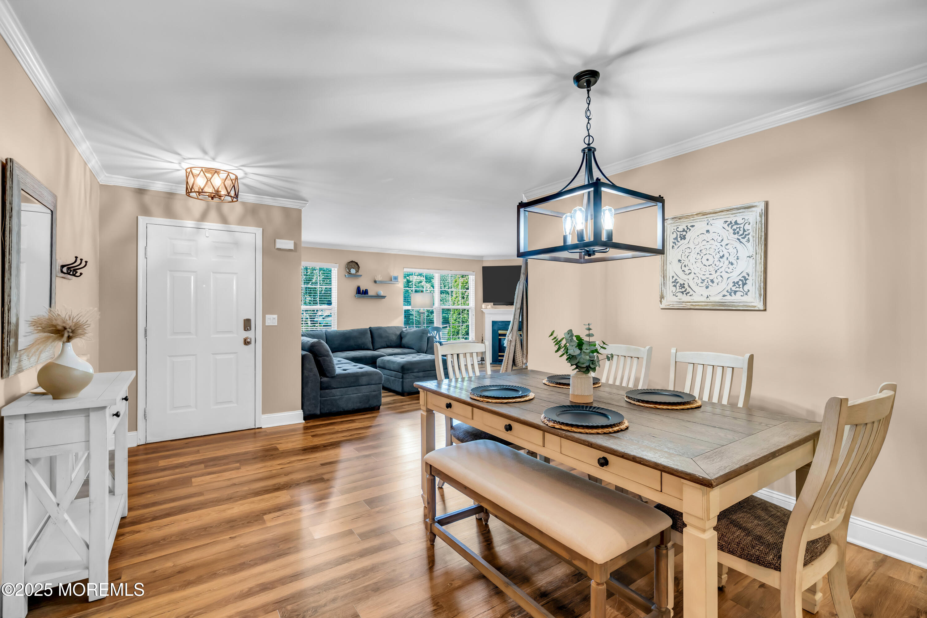 455 Deuce Drive Wall, NJ 07719 - Photo 4 of 26 a view of a dining room with furniture window and wooden floor
