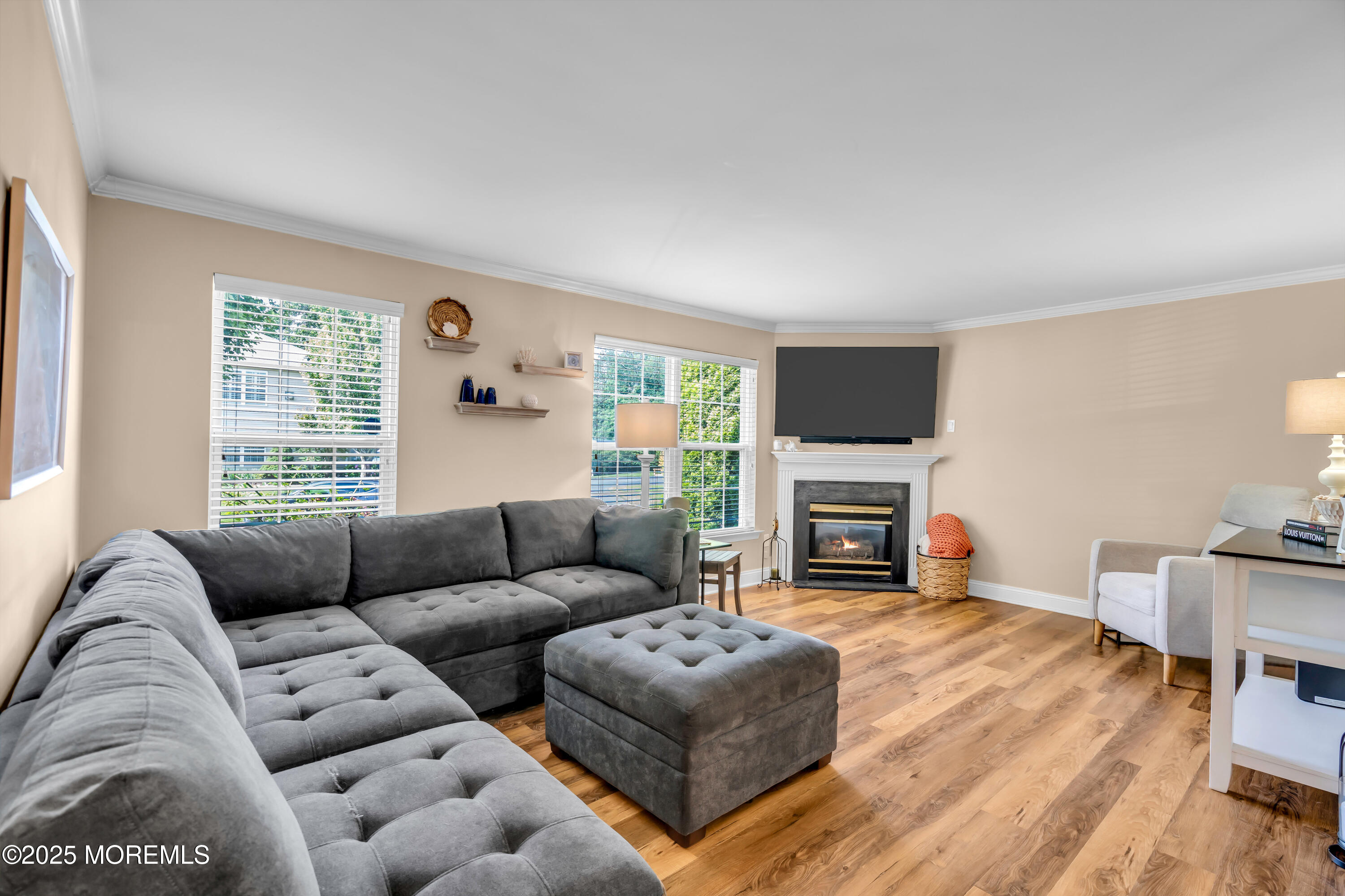 455 Deuce Drive Wall, NJ 07719 - Photo 7 of 26 a living room with furniture window and a fireplace