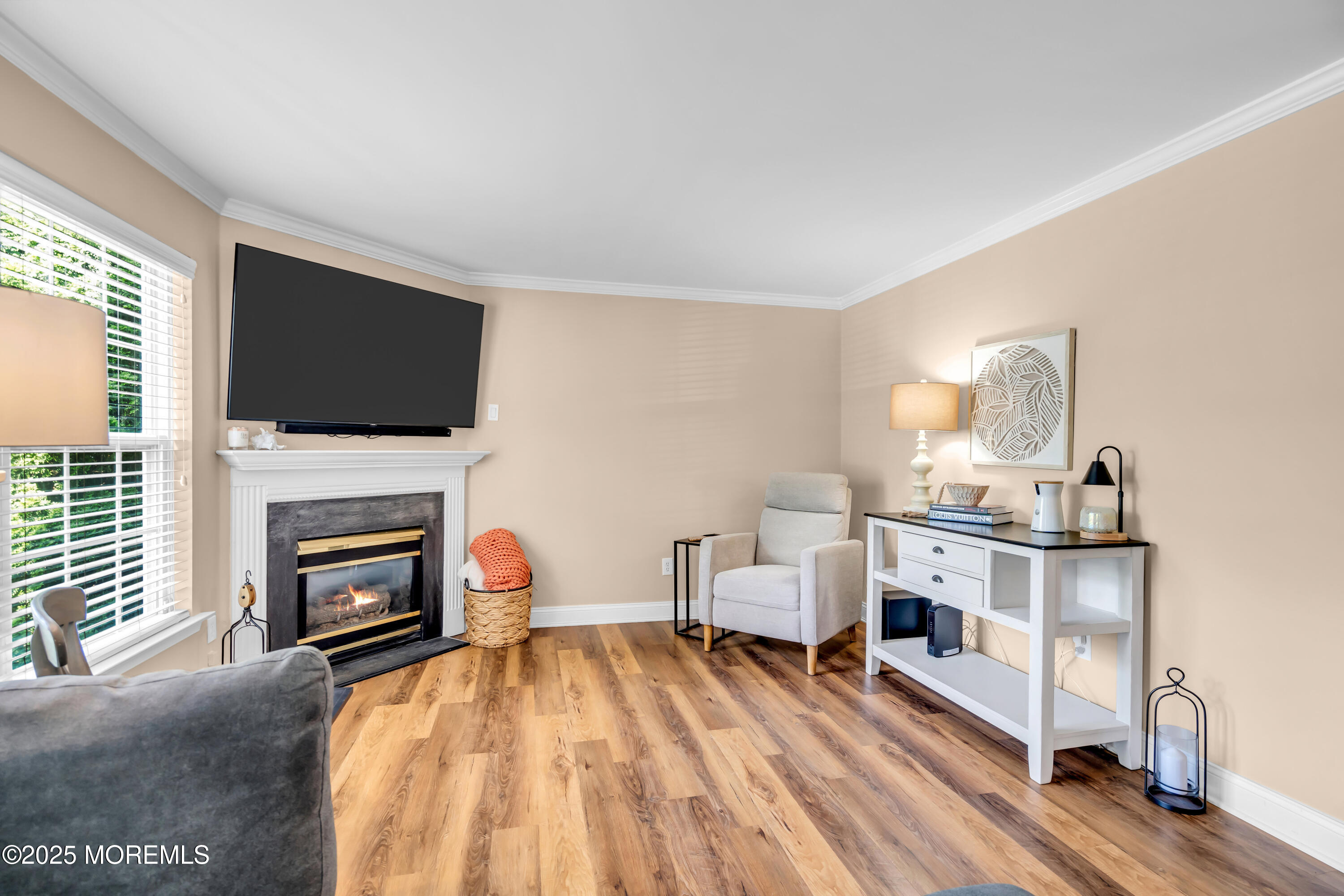 455 Deuce Drive Wall, NJ 07719 - Photo 8 of 26 a living room with furniture and a flat screen tv