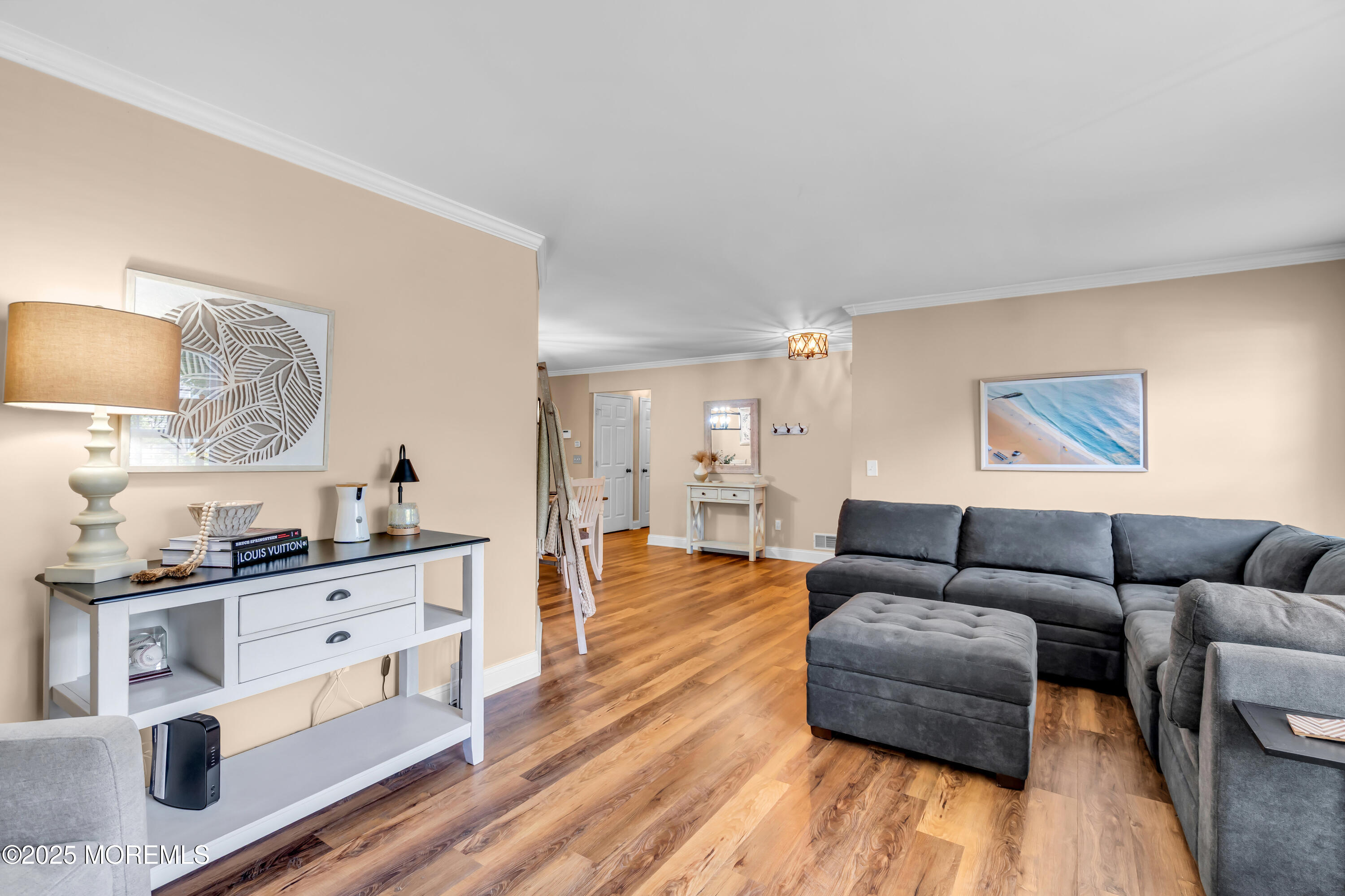 455 Deuce Drive Wall, NJ 07719 - Photo 9 of 26 a living room with furniture and a wooden floor