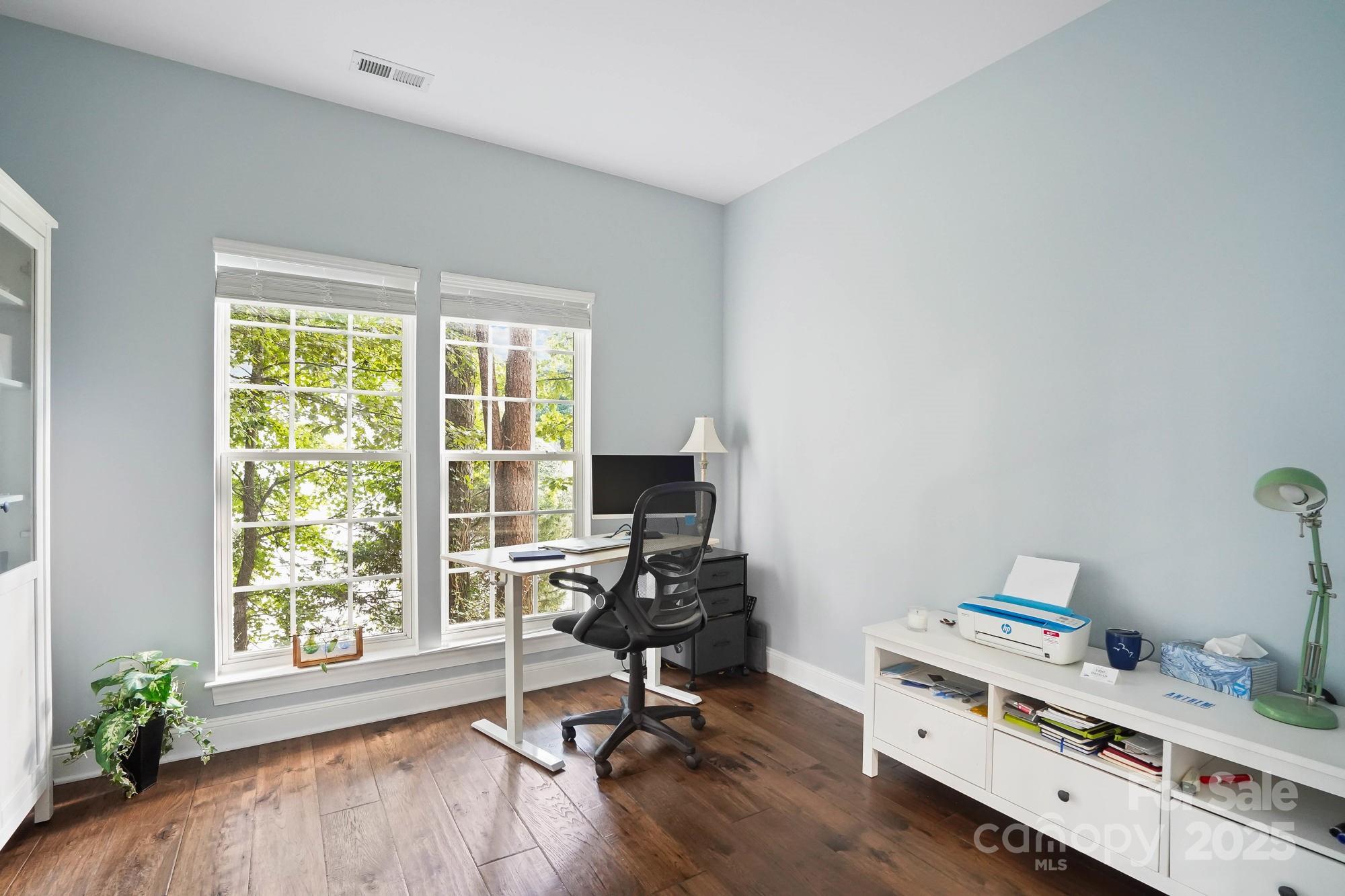 409 Stonewater Bay Mount Holly, NC 28120 - Photo 26 of 47 a view of a workspace with furniture and a window