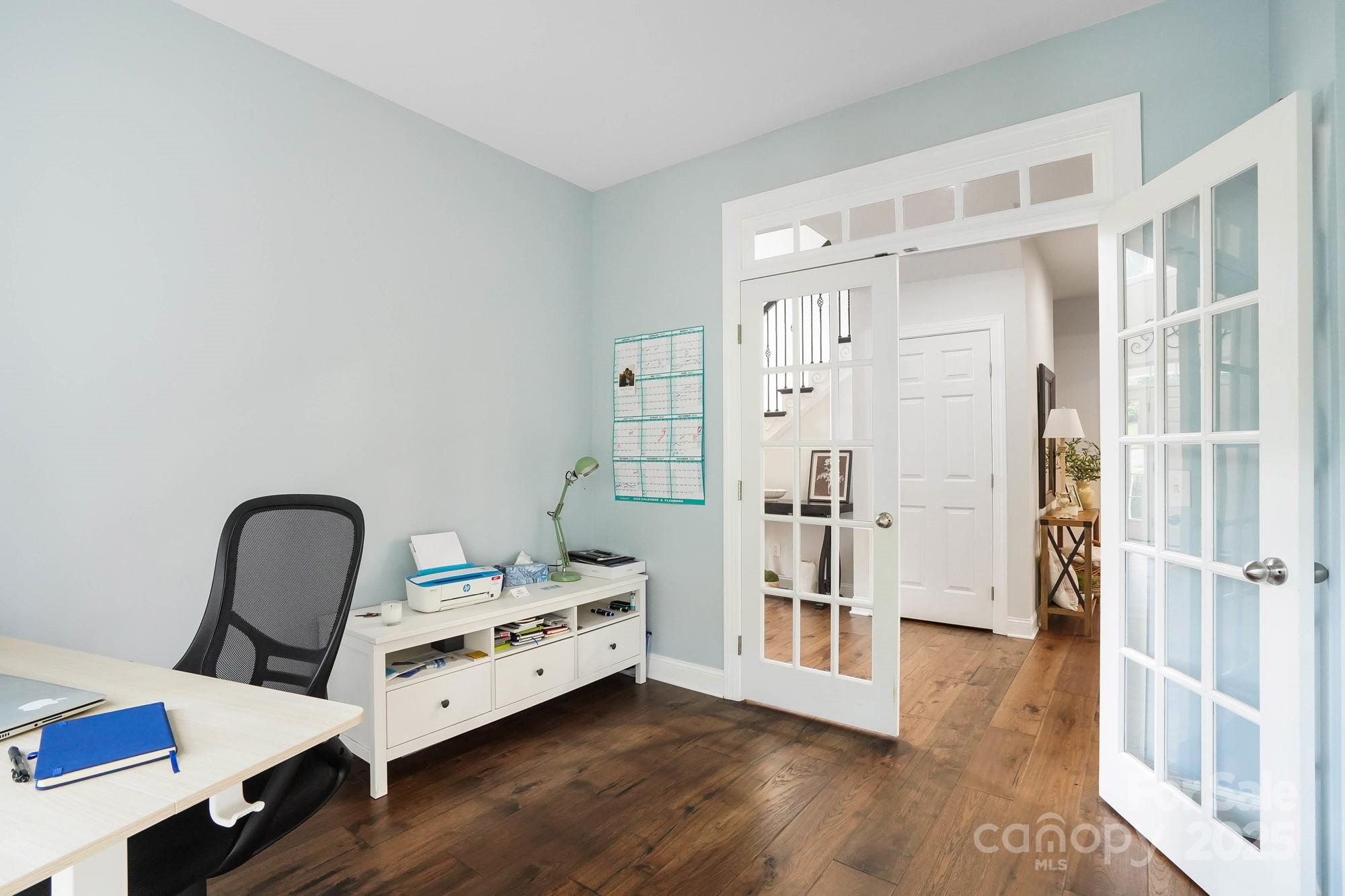 409 Stonewater Bay Mount Holly, NC 28120 - Photo 27 of 47 a room with a wooden floor and furniture
