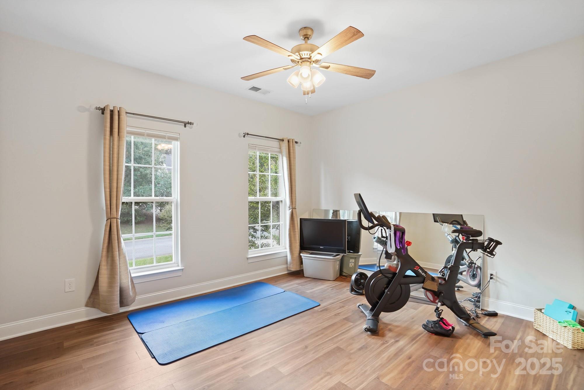 409 Stonewater Bay Mount Holly, NC 28120 - Photo 37 of 47 a view of a room with gym equipment