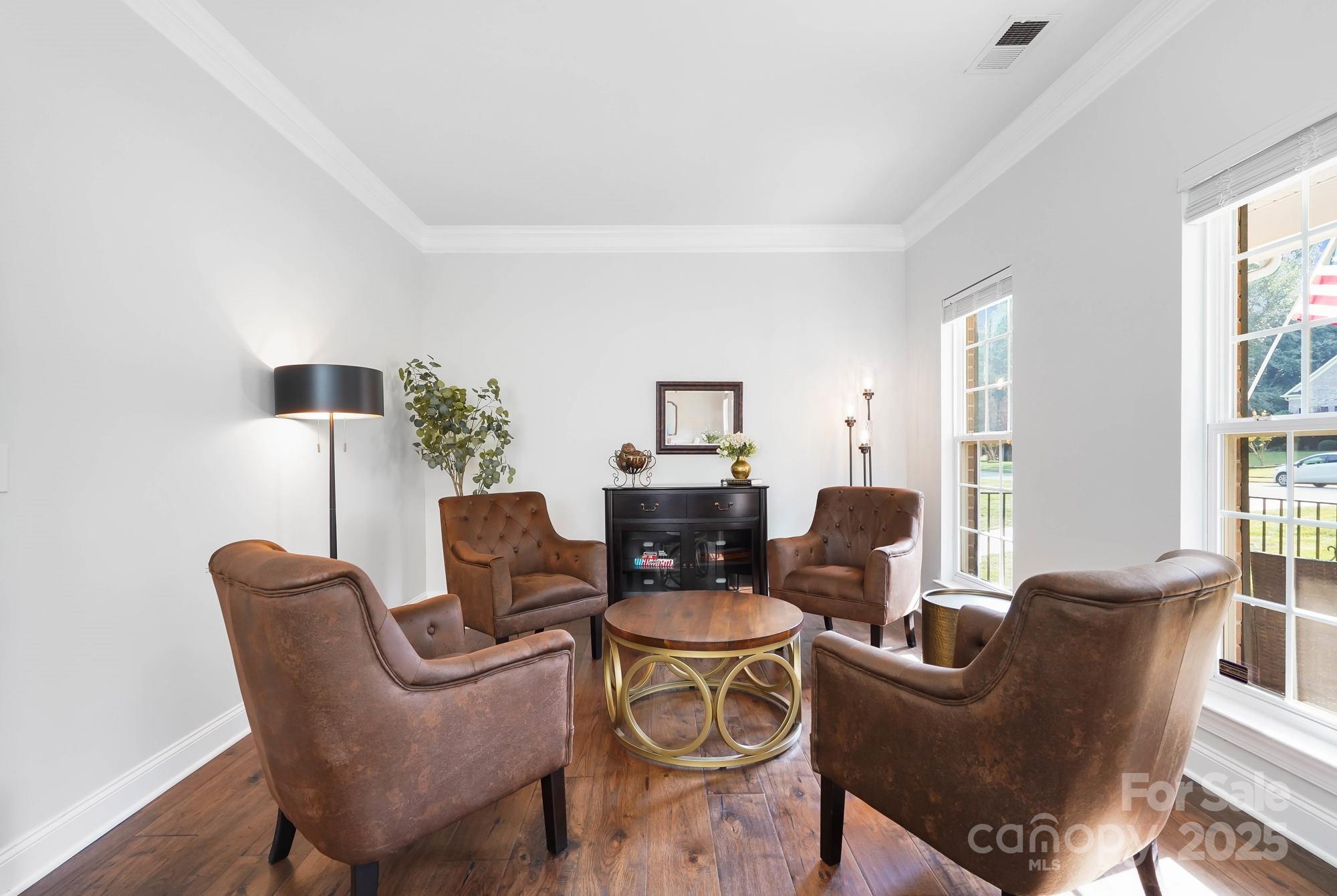 409 Stonewater Bay Mount Holly, NC 28120 - Photo 9 of 47 a living room with furniture and a window