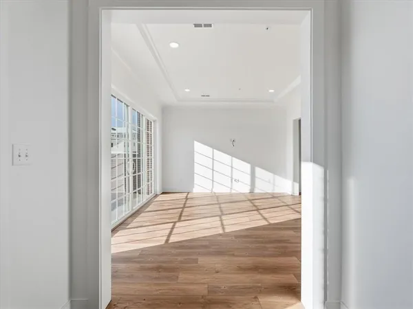 a view of an empty room and window