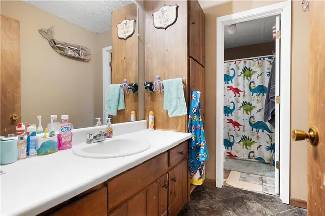 a bedroom with toys and a baby crib