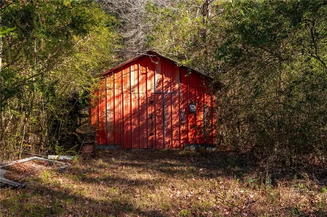 a backyard of a house with lots of green space