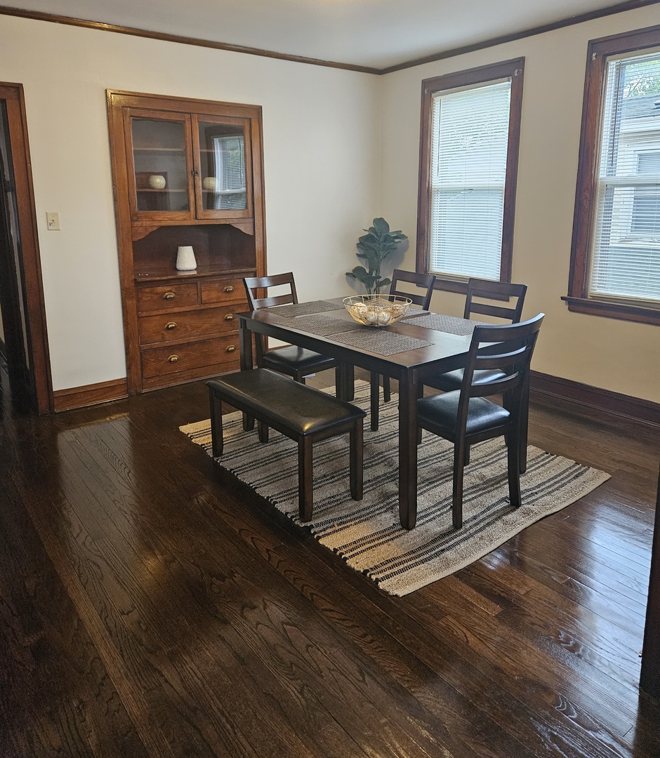 2446 Lewis Street, Unit 2 Blue Island, IL 60406 - Photo 3 of 18 a dining room with furniture and wooden floor