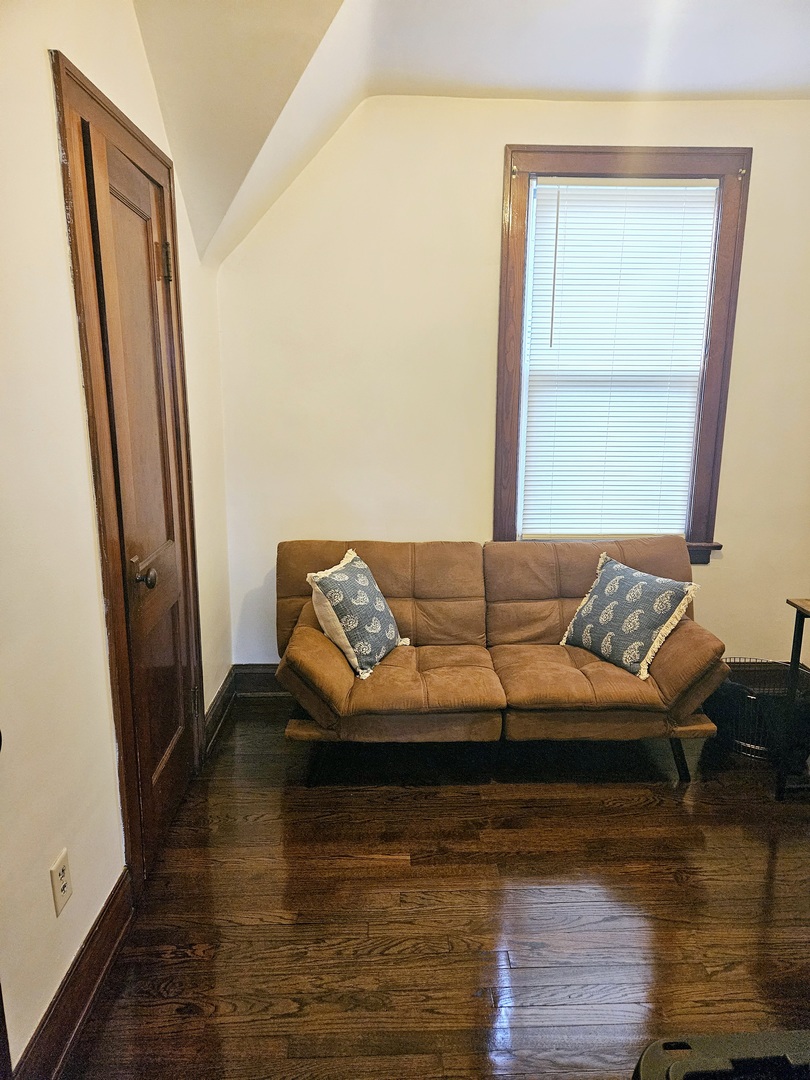 2446 Lewis Street, Unit 2 Blue Island, IL 60406 - Photo 8 of 18 a living room with furniture and a wooden floor