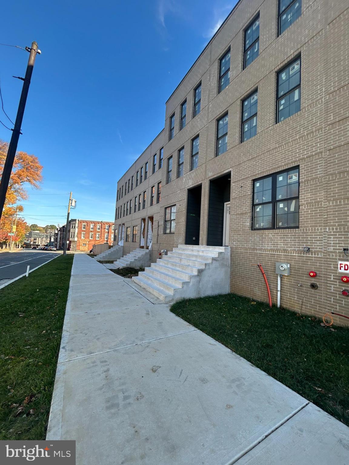3929-31 Ridge Avenue Philadelphia, PA 19132 - Photo 7 of 12 a view of a building with a yard