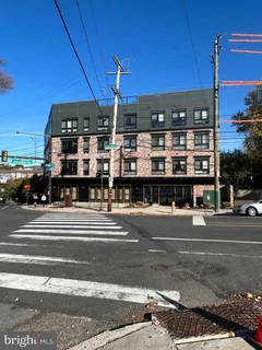 a view of a car park in front of house