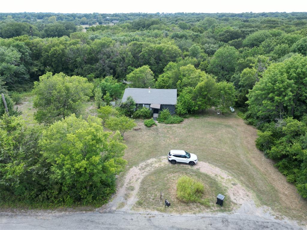1214 Old Millwood Road Rockwall, TX 75087 - Photo 2 of 24 an aerial view of a house with a yard