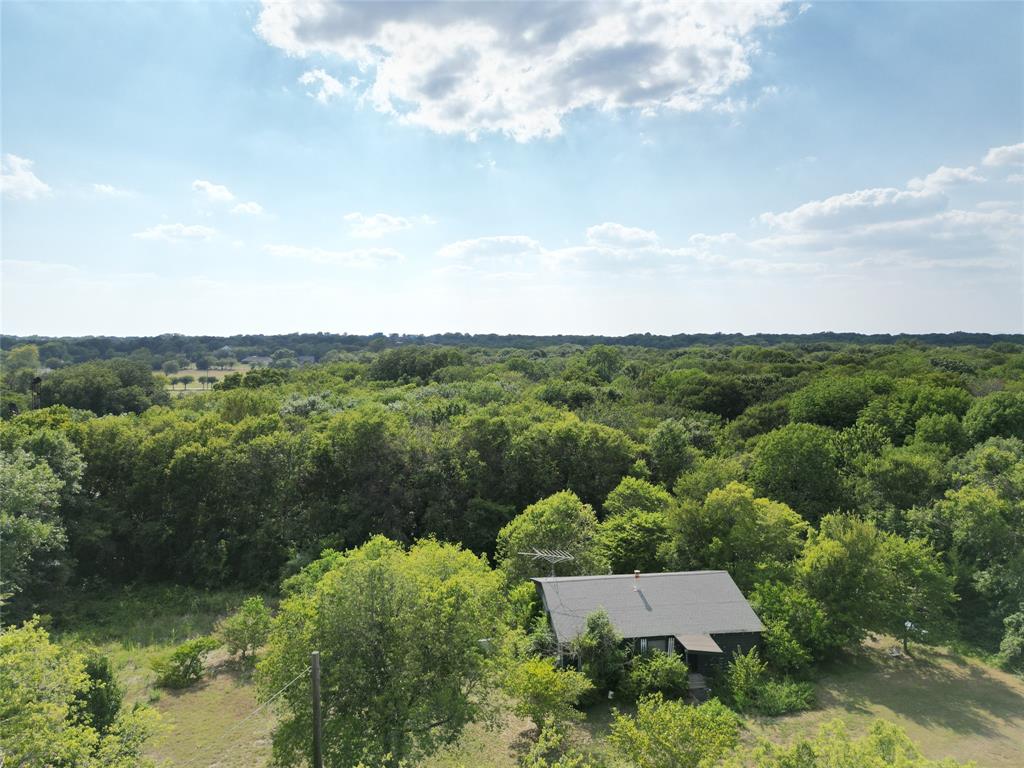 1214 Old Millwood Road Rockwall, TX 75087 - Photo 22 of 24 an aerial view of a house with mountain view