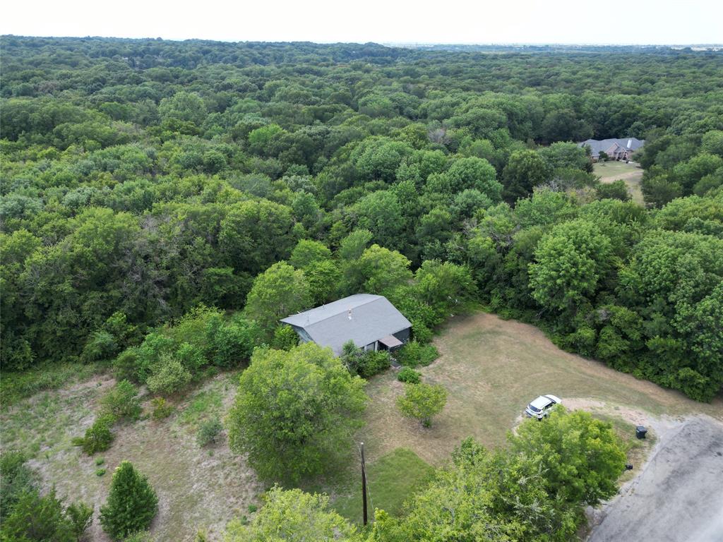 1214 Old Millwood Road Rockwall, TX 75087 - Photo 3 of 24 an aerial view of a house with a yard