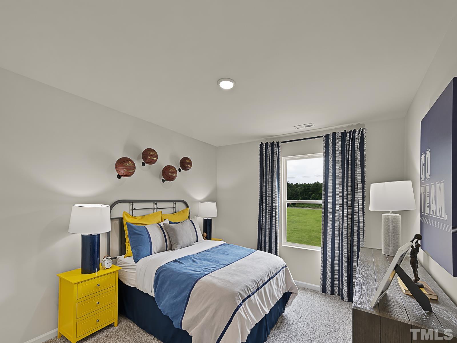 3013 Farndale Trace Durham, NC 27712 - Photo 11 of 14 a bedroom with a bed and wooden floor