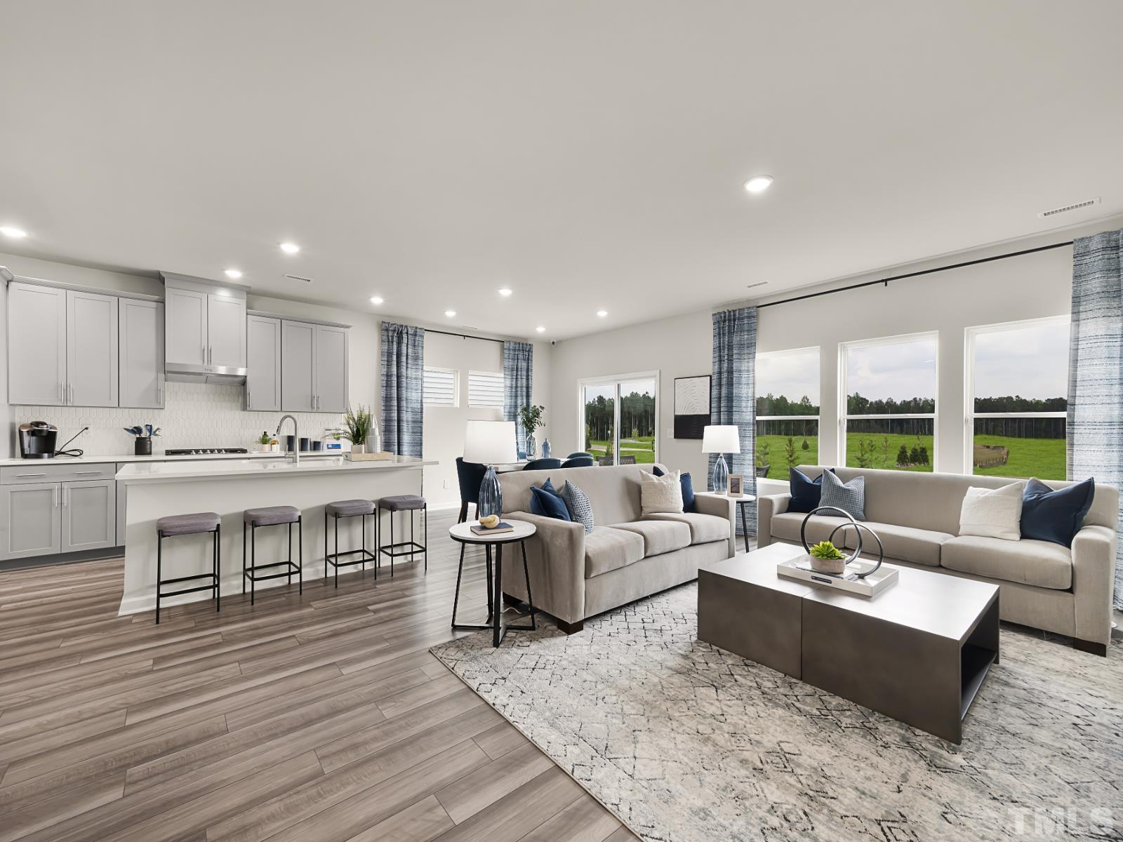 3013 Farndale Trace Durham, NC 27712 - Photo 4 of 14 a living room with furniture and a large window