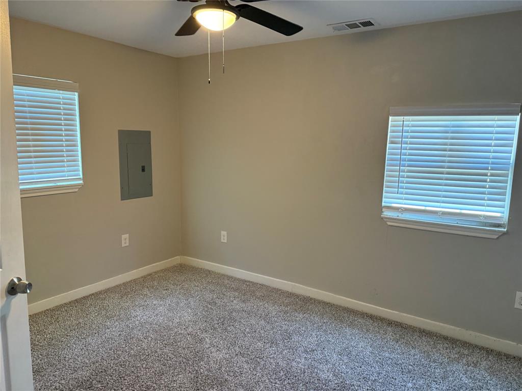 2781 Locust Avenue Dallas, TX 75216 - Photo 13 of 15 an empty room with a window
