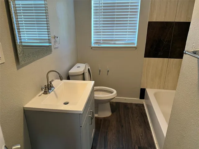 a bathroom with a sink and a toilet
