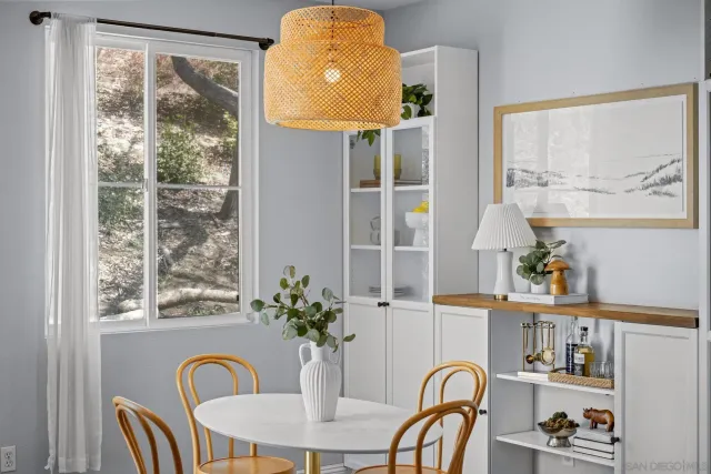 a view of balcony with wooden floor and seating space