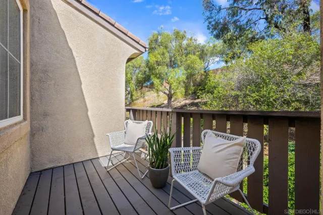 a view of a hallway with washer and dryer
