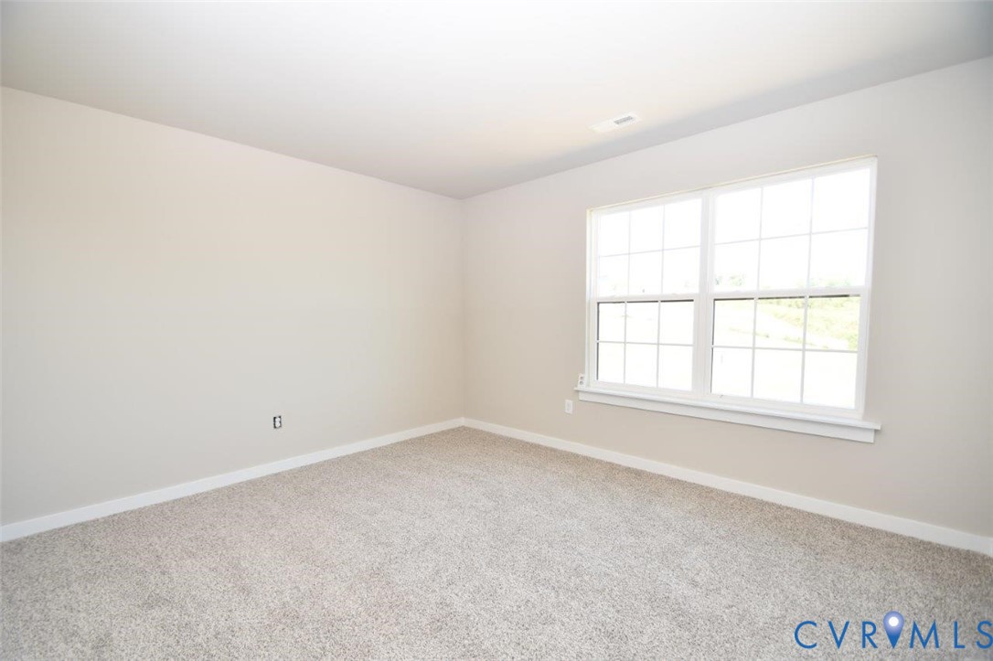 1088 Hanback Road Gordonsville, VA 22942 - Photo 5 of 26 an empty room with a window